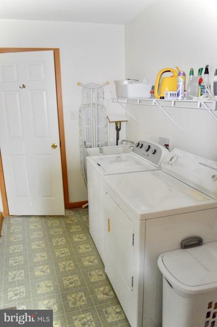 1450 Stringtown Road Berryville, VA 22611 - Photo 13 of 13 a utility room with washer and dryer