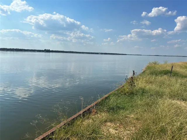 a view of a lake from a balcony