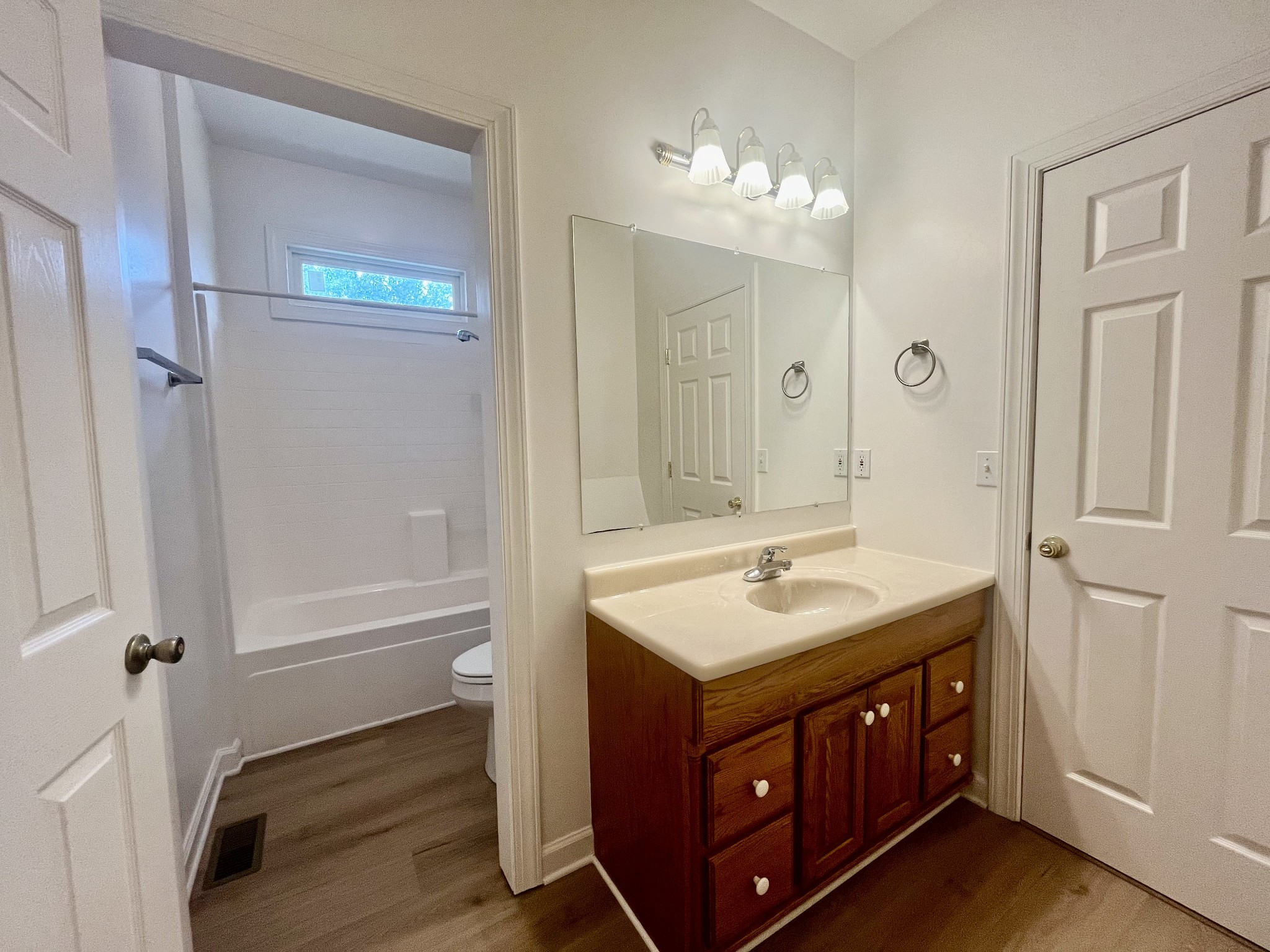 650 Vanderbilt Road Mount Juliet, TN 37122 - Photo 12 of 45 a bathroom with a tub a sink and a mirror