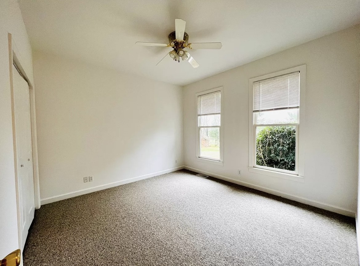 650 Vanderbilt Road Mount Juliet, TN 37122 - Photo 14 of 45 an empty room with windows and ceiling fan