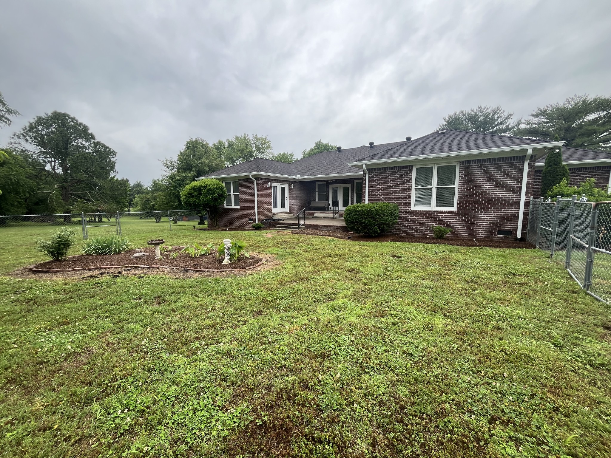 650 Vanderbilt Road Mount Juliet, TN 37122 - Photo 43 of 45 a view of a house with a yard and potted plants