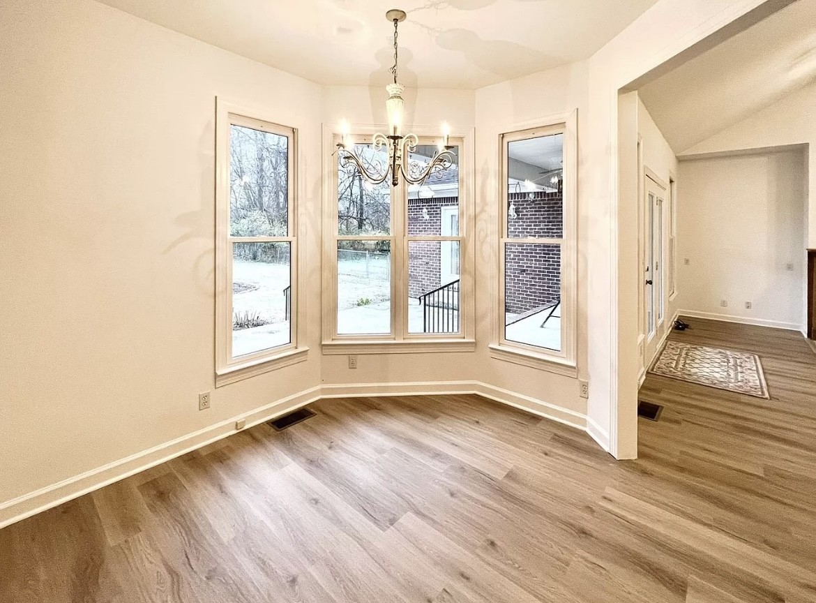 650 Vanderbilt Road Mount Juliet, TN 37122 - Photo 5 of 45 a view of an empty room with a window and wooden floor