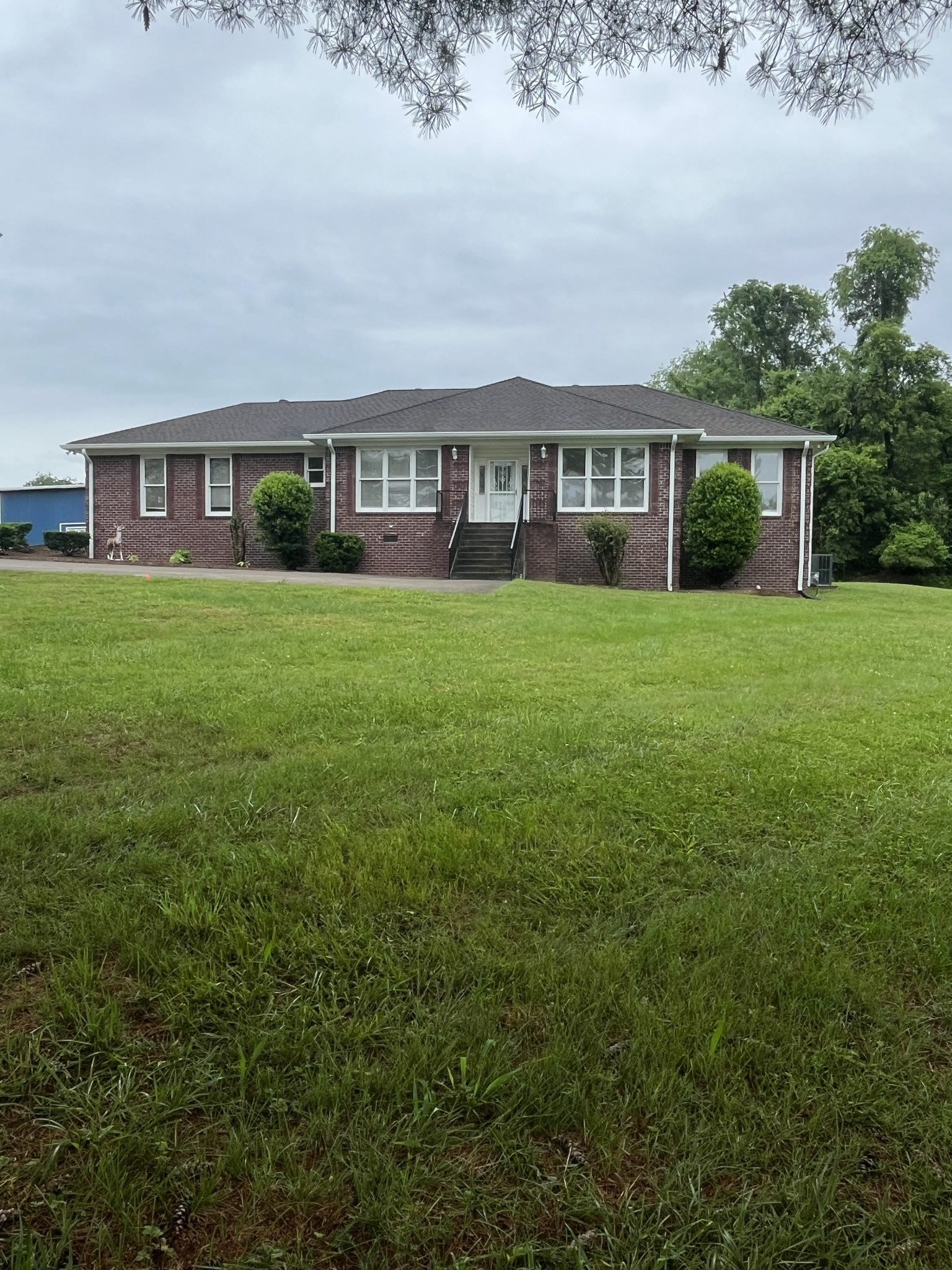 650 Vanderbilt Road Mount Juliet, TN 37122 - Photo 6 of 45 a view of a big yard in front of a house with a yard