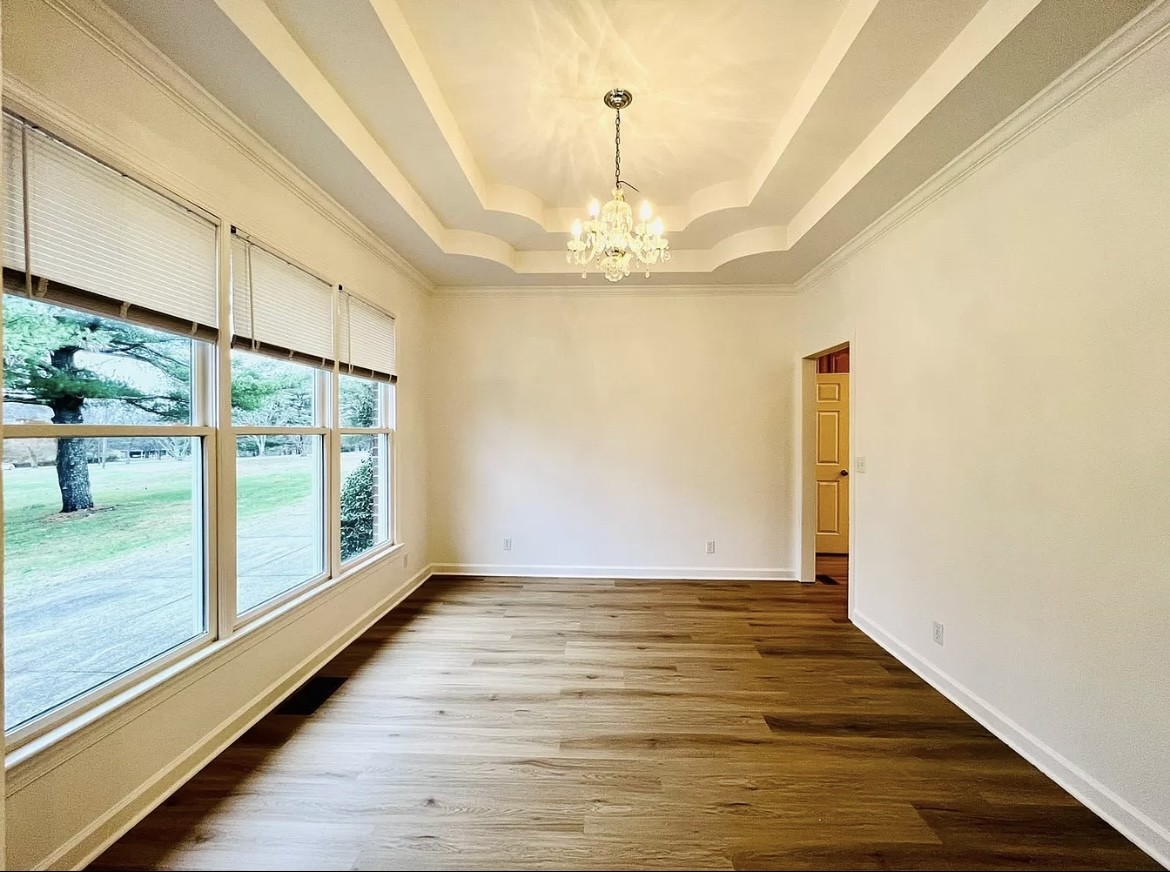 650 Vanderbilt Road Mount Juliet, TN 37122 - Photo 8 of 45 a view of empty room with wooden floor and fan