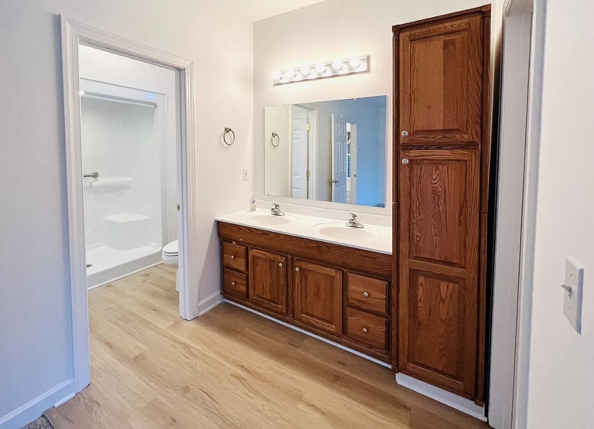 650 Vanderbilt Road Mount Juliet, TN 37122 - Photo 9 of 45 a bathroom with a double vanity sink and a mirror