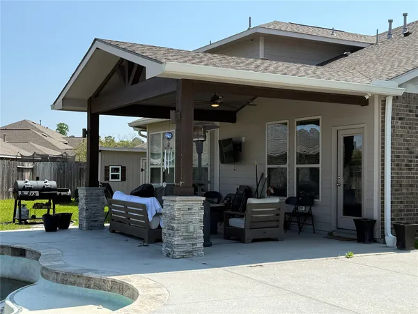 a outdoor living space with furniture and garden view