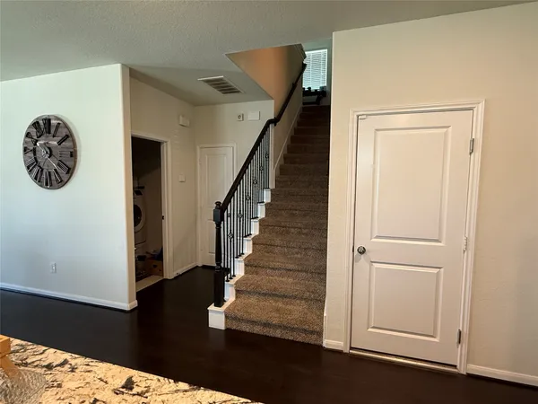 a living room with furniture and window