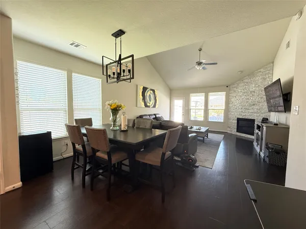 a bathroom with a tub a sink and a shower