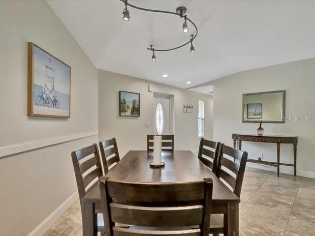 a view of a dining room with furniture