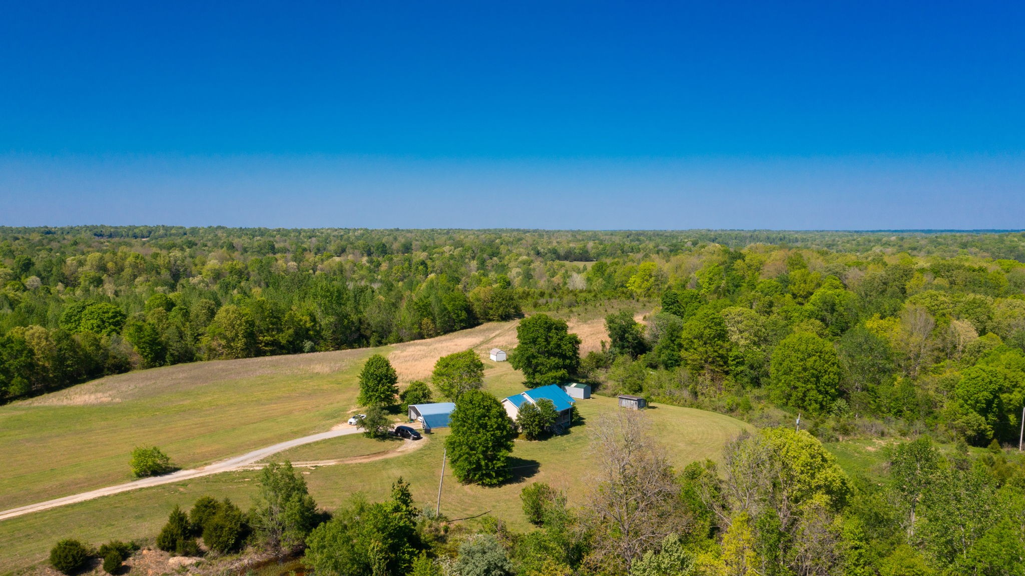 881 Coaling Road Charlotte, TN 37036 - Photo 29 of 29 a view of a lake from a yard