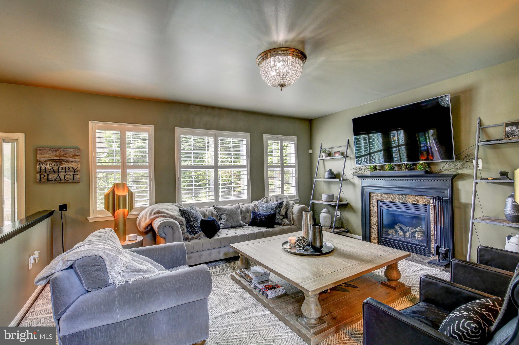 2028 Baythorne Road Prince Frederick, MD 20678 - Photo 12 of 51 Family Room and a cozy gas fireplace