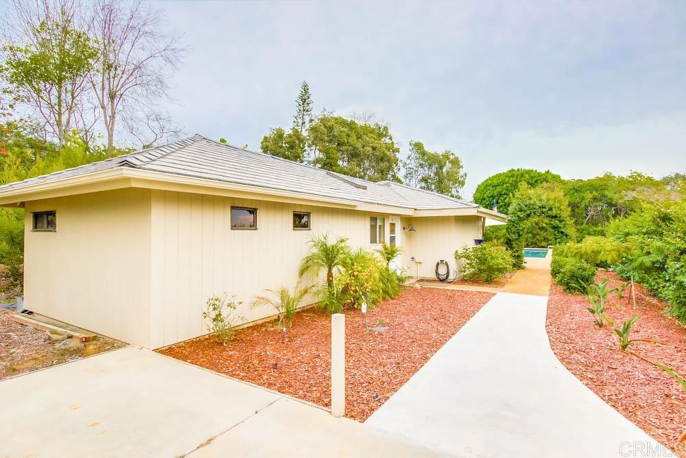 17355 Avenida De Acacias Rancho Santa Fe, CA 92067 - Photo 14 of 16 a view of a house with pool
