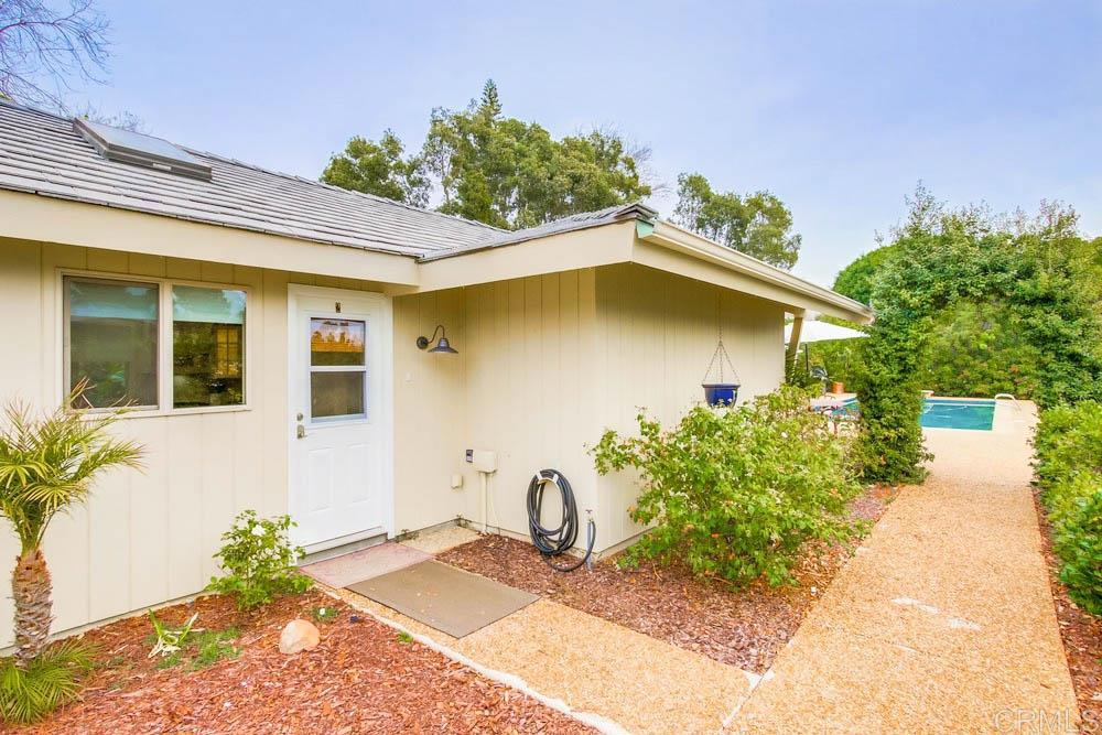 17355 Avenida De Acacias Rancho Santa Fe, CA 92067 - Photo 15 of 16 a front view of a house with garden