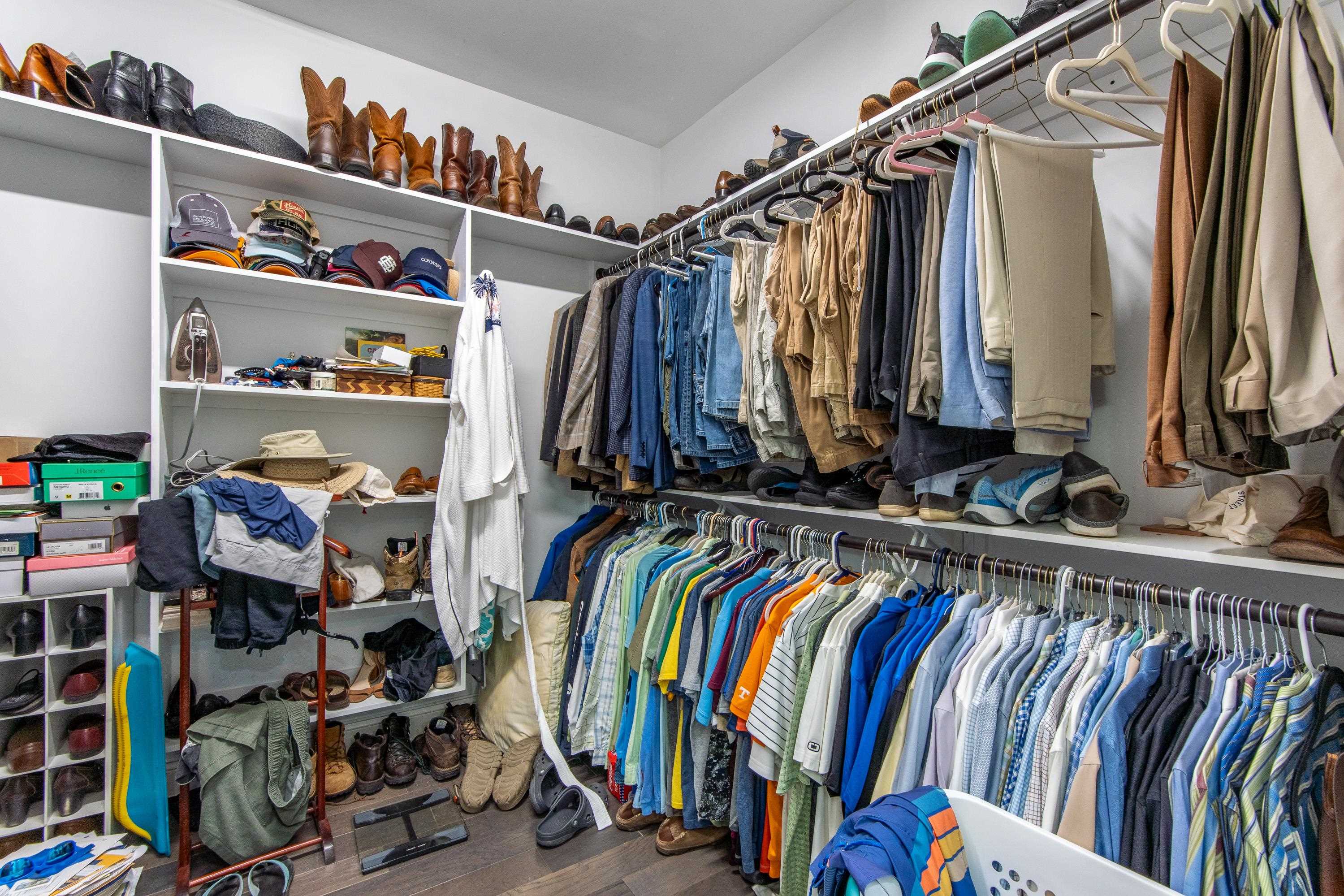 55 Ridge Pointe Drive Savannah, TN 38372 - Photo 17 of 40 Walk in closet with hardwood / wood-style floors