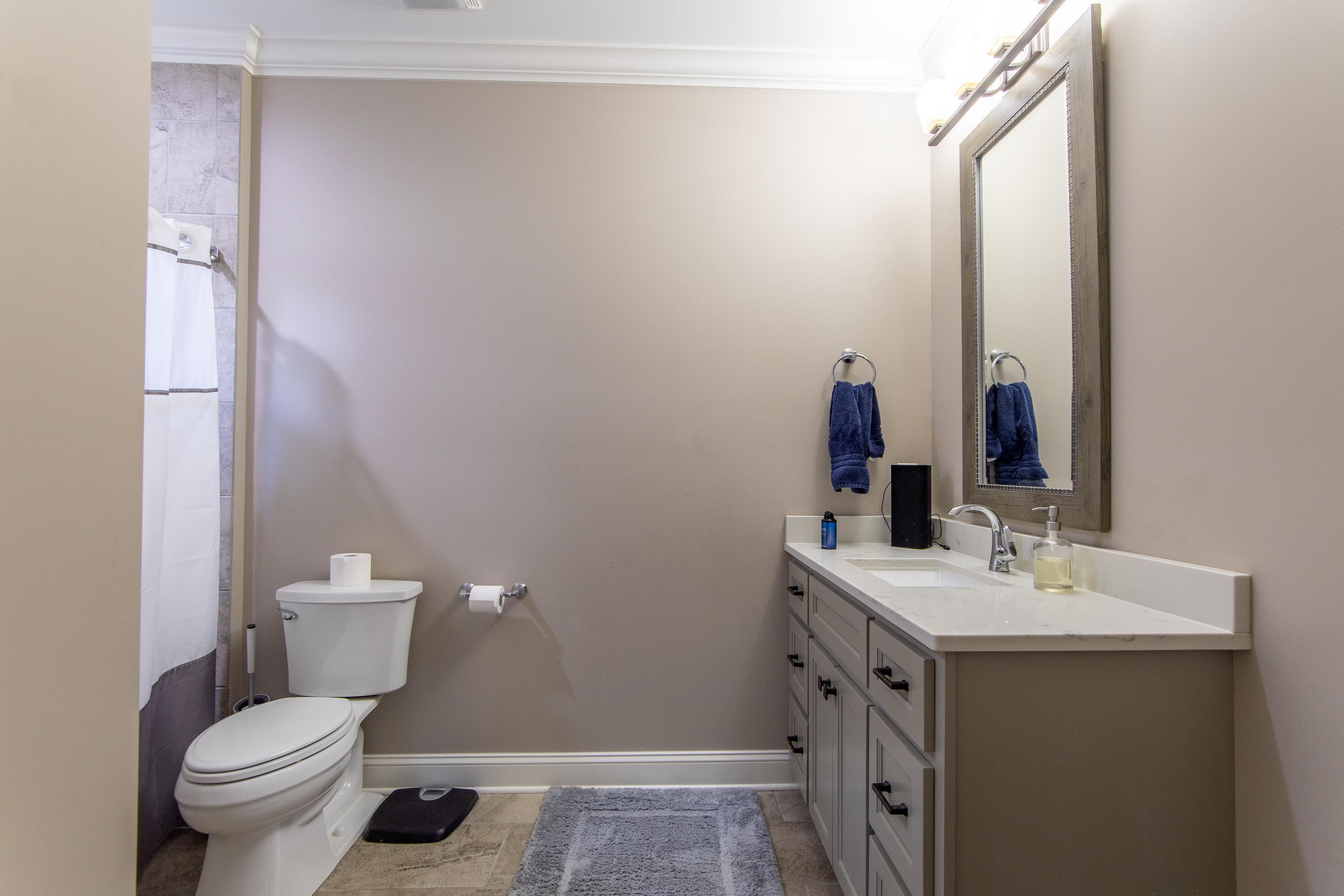 55 Ridge Pointe Drive Savannah, TN 38372 - Photo 23 of 40 Bathroom featuring vanity, crown molding, toilet, and tile patterned flooring