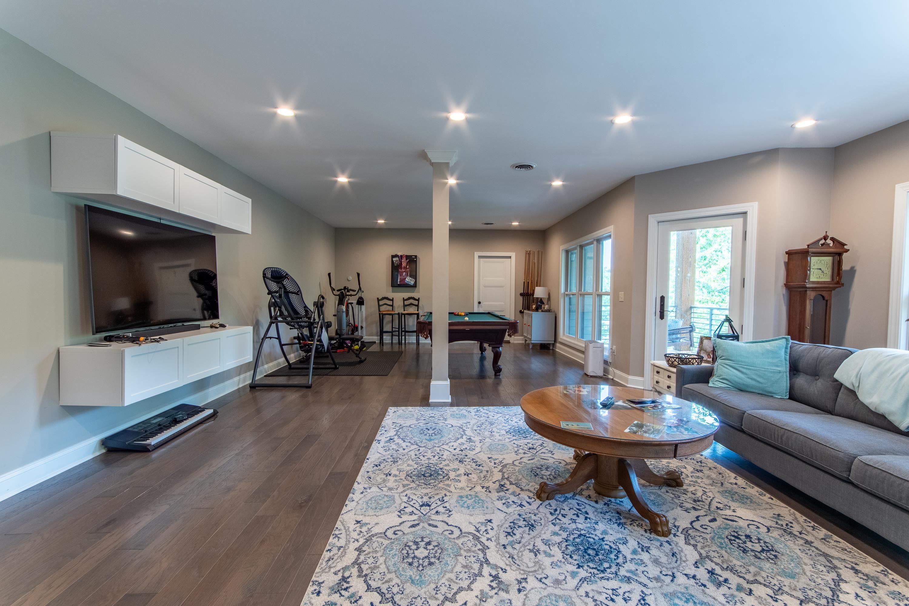 55 Ridge Pointe Drive Savannah, TN 38372 - Photo 24 of 40 Living room featuring dark wood-type flooring and billiards