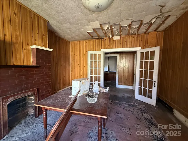 a view of a patio with table and chairs