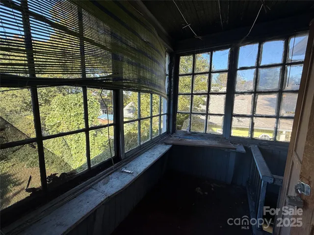 a bathroom with a granite countertop toilet a sink and a bathtub