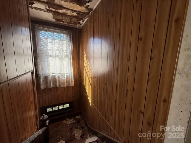 a view of a porch with wooden floor
