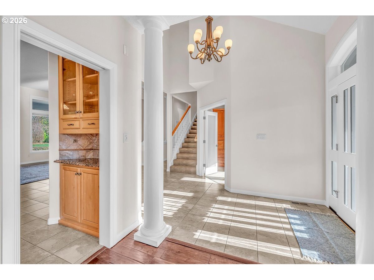 34043 Bennett Road Warren, OR 97053 - Photo 15 of 46 a view of an entryway with wooden floor