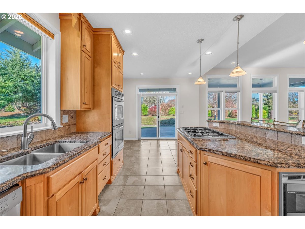 34043 Bennett Road Warren, OR 97053 - Photo 20 of 46 a kitchen with a sink and cabinets