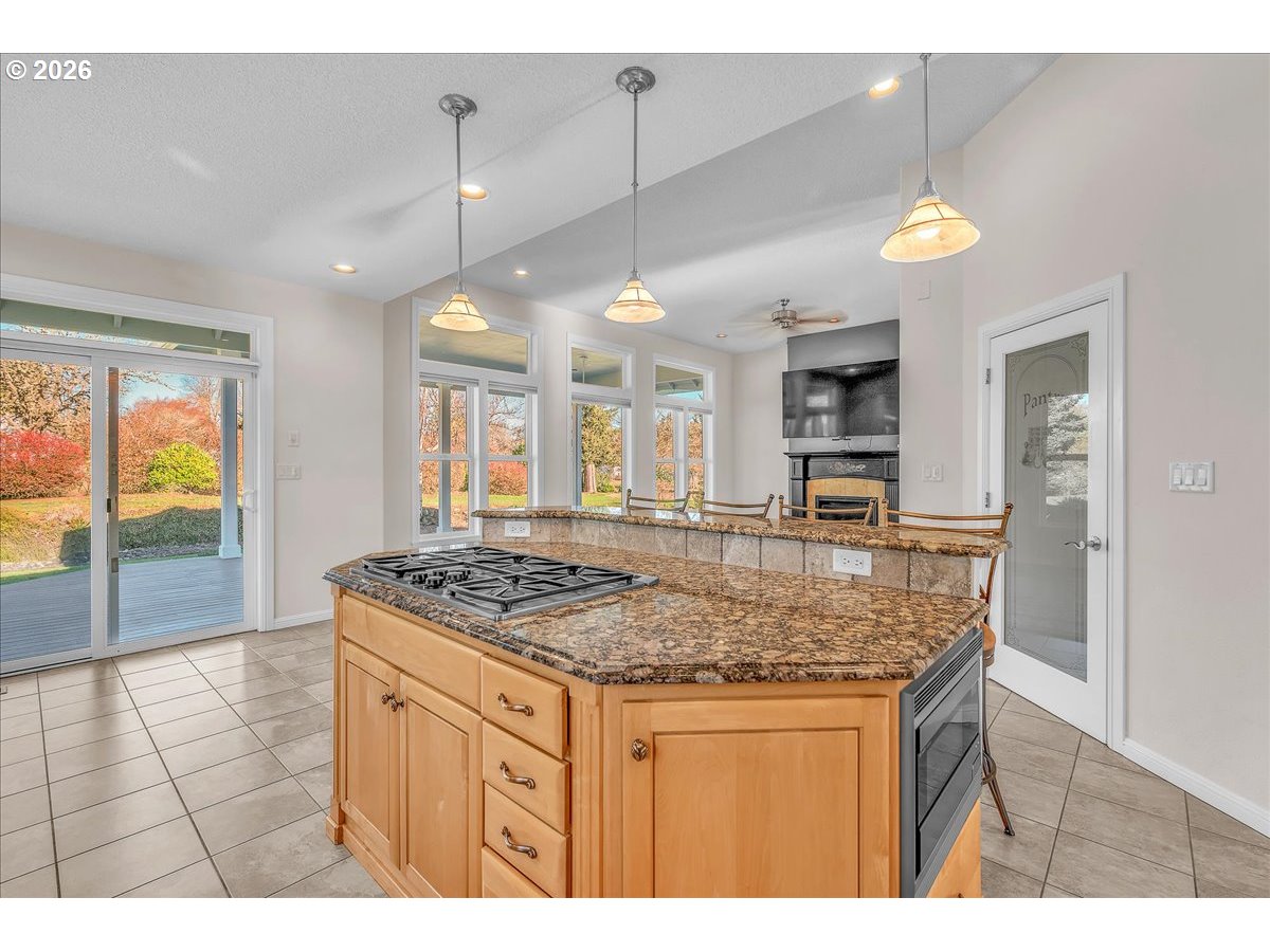34043 Bennett Road Warren, OR 97053 - Photo 21 of 46 a kitchen with a counter space a sink and cabinets
