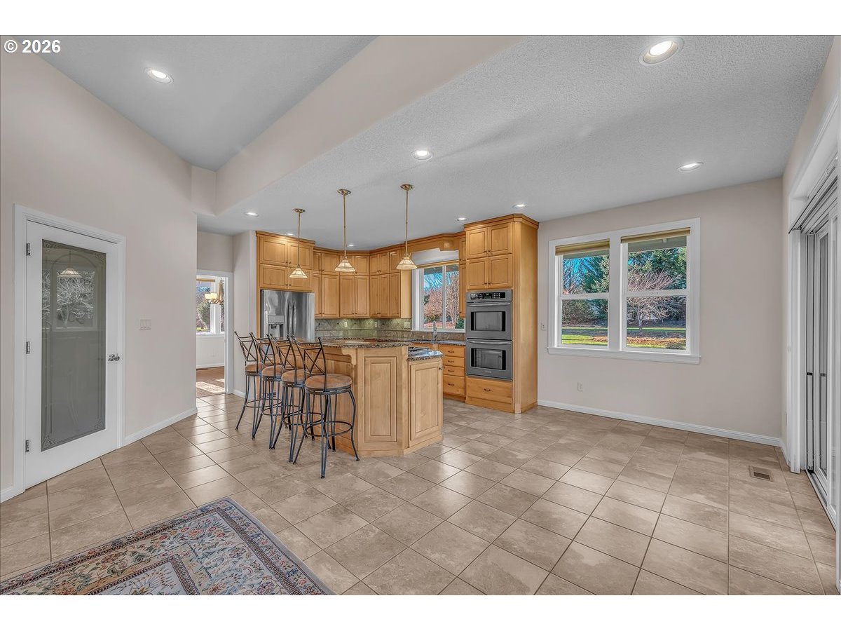 34043 Bennett Road Warren, OR 97053 - Photo 22 of 46 a view of a kitchen with furniture and a window