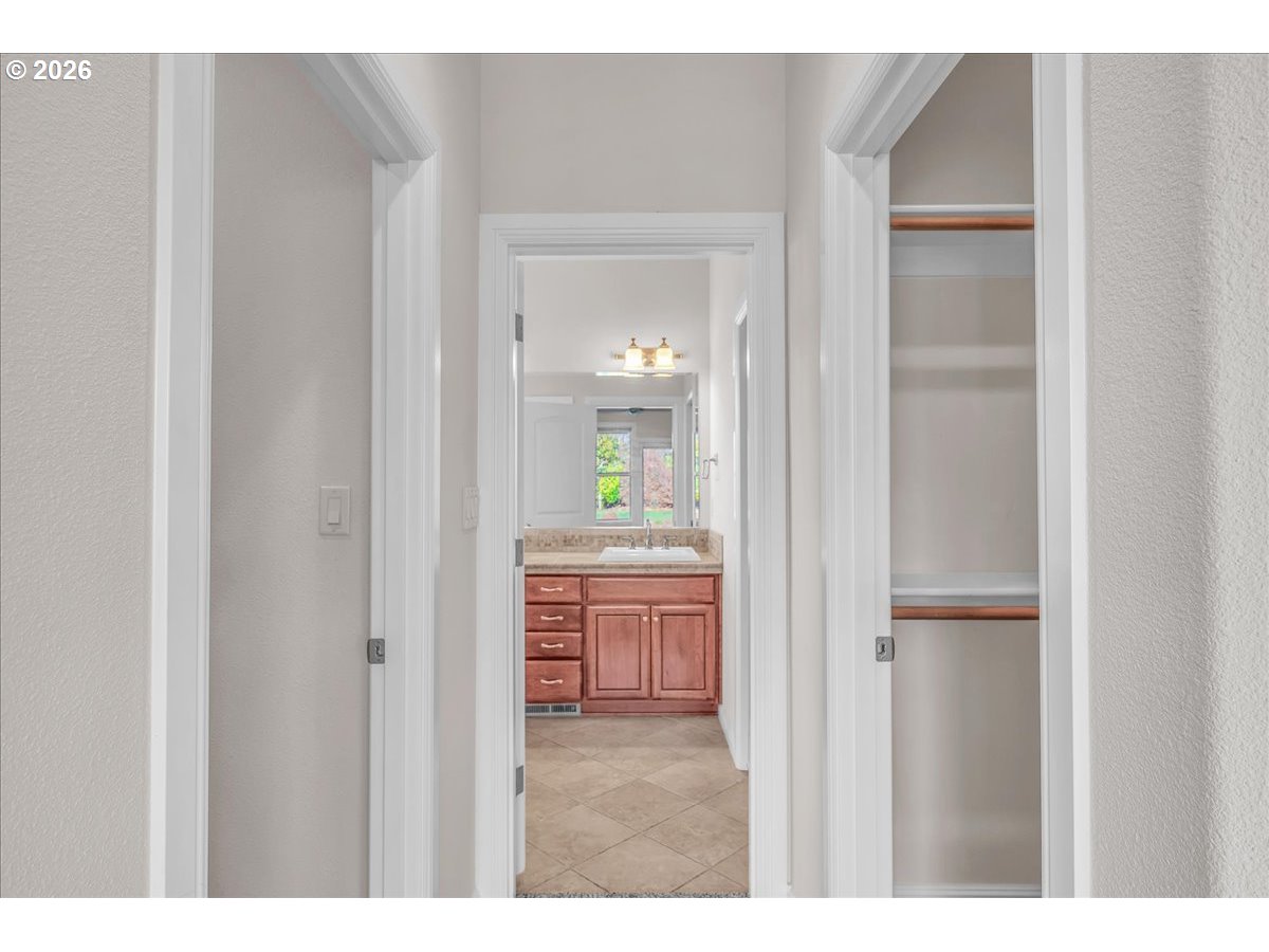 34043 Bennett Road Warren, OR 97053 - Photo 31 of 46 a bathroom with a vanity and a mirror