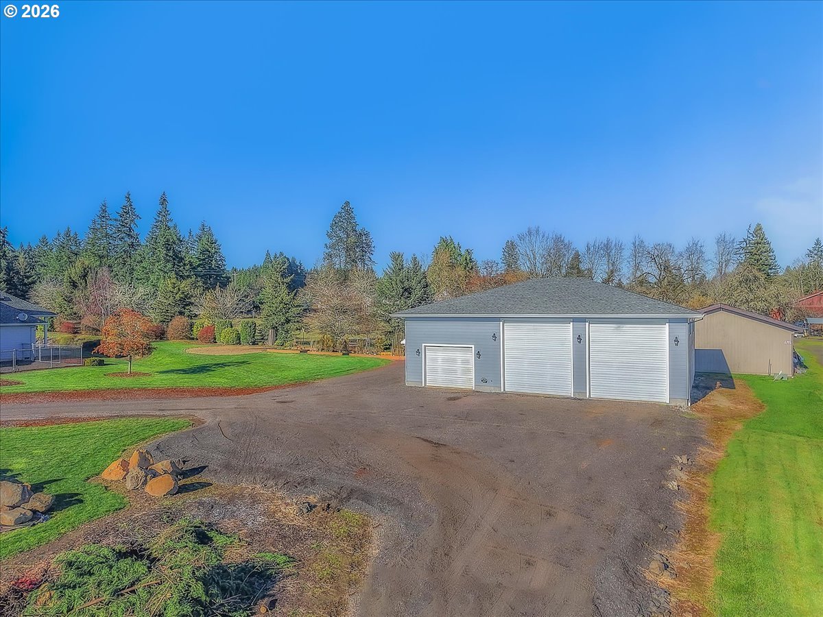 34043 Bennett Road Warren, OR 97053 - Photo 42 of 46 a view of a house with a yard