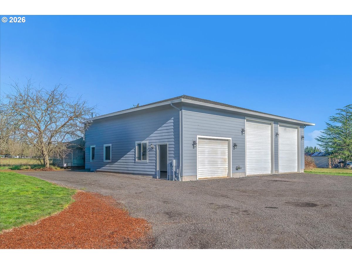 34043 Bennett Road Warren, OR 97053 - Photo 8 of 46 a view of a house with a yard