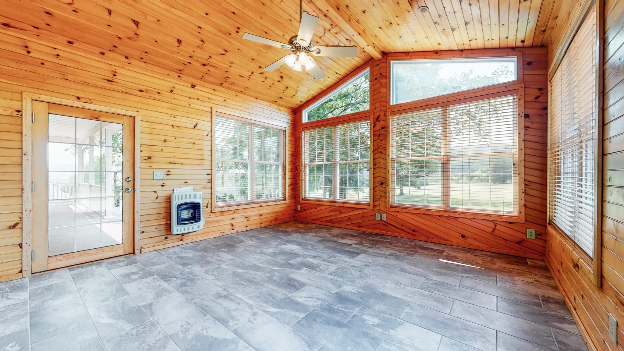 656 Greenvale Road Milton, TN 37118 - Photo 14 of 43 a view of an empty room with a fireplace and a window
