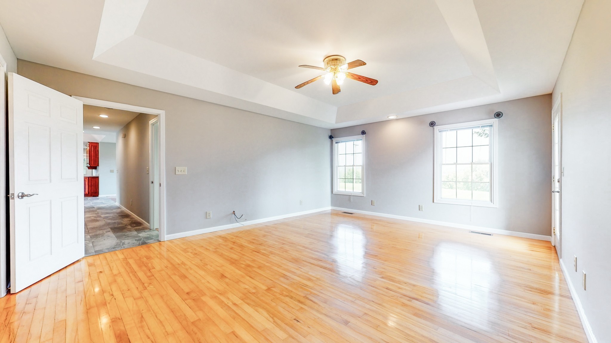 656 Greenvale Road Milton, TN 37118 - Photo 17 of 43 a view of empty room with wooden floor and fan