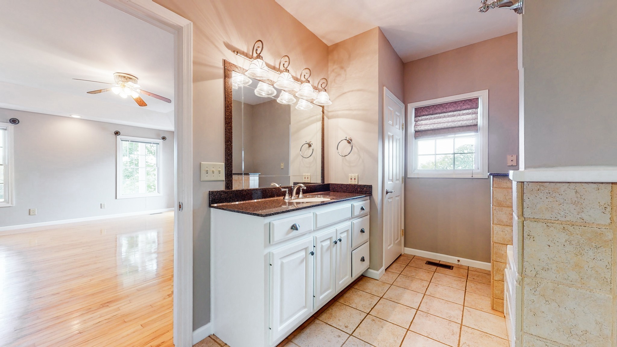 656 Greenvale Road Milton, TN 37118 - Photo 18 of 43 a bathroom with a double vanity sink and a mirror