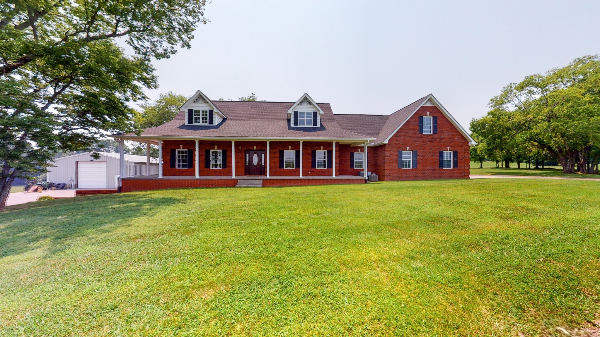 656 Greenvale Road Milton, TN 37118 - Photo 5 of 43 a front view of a house with garden