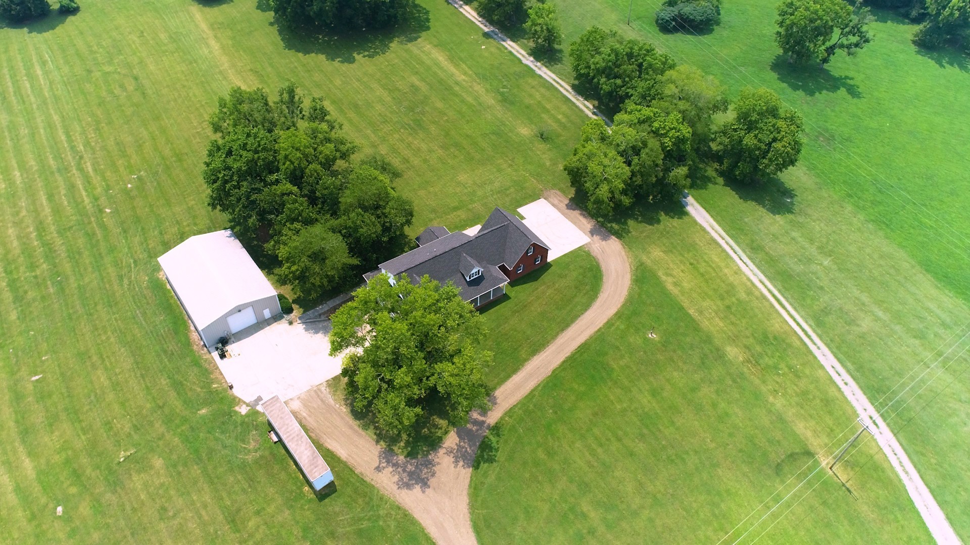 656 Greenvale Road Milton, TN 37118 - Photo 41 of 43 a view of a swimming pool with a garden