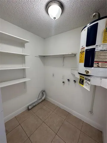 a view of workspace with cabinets