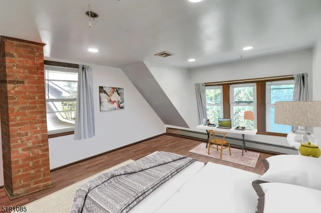 a living room with furniture and windows