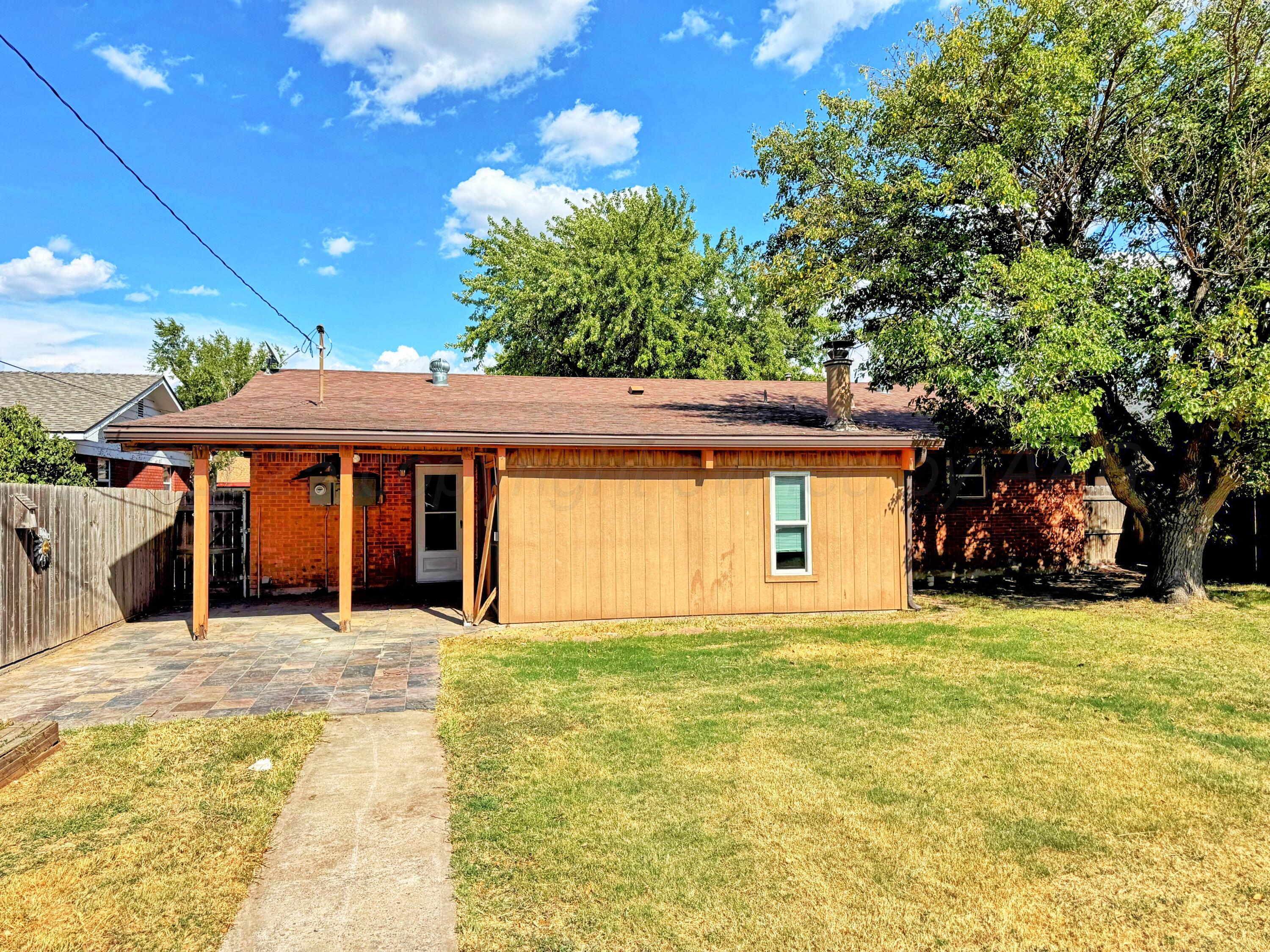 2214 Harvard Drive Perryton, TX 79070 - Photo 18 of 20 a view of a house with a outdoor space