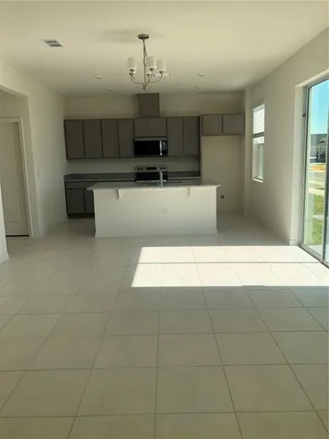 a view of a kitchen with a sink