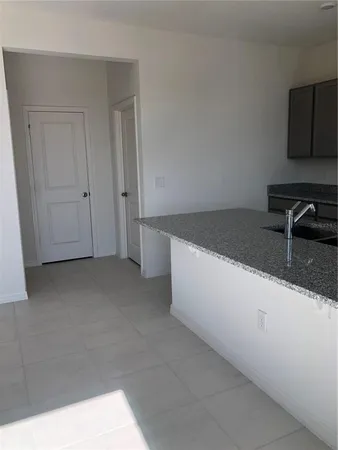 a view of kitchen and hallway