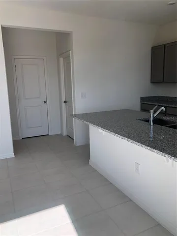 a view of kitchen and hallway