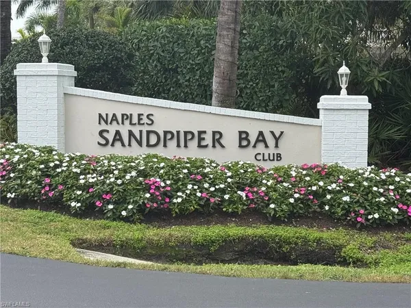 a sign on the side of the road