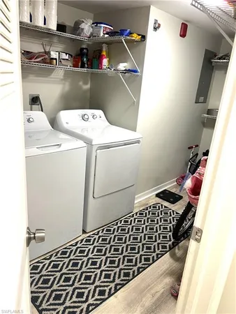 a utility room with dryer and washer