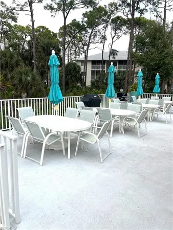 a view of a patio with a backyard