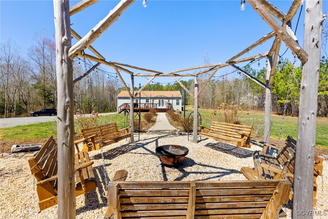 17066 Goshen Road Montpelier, VA 23192 - Photo 32 of 46 outdoor swing and fire pit are