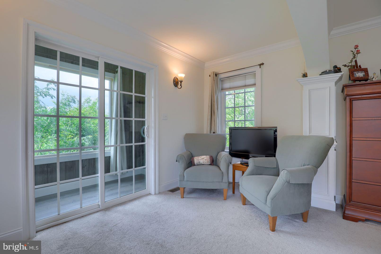 953 Buckwalter Road Lititz, PA 17543 - Photo 25 of 31 Primary bedroom sitting area and enclosed balcony