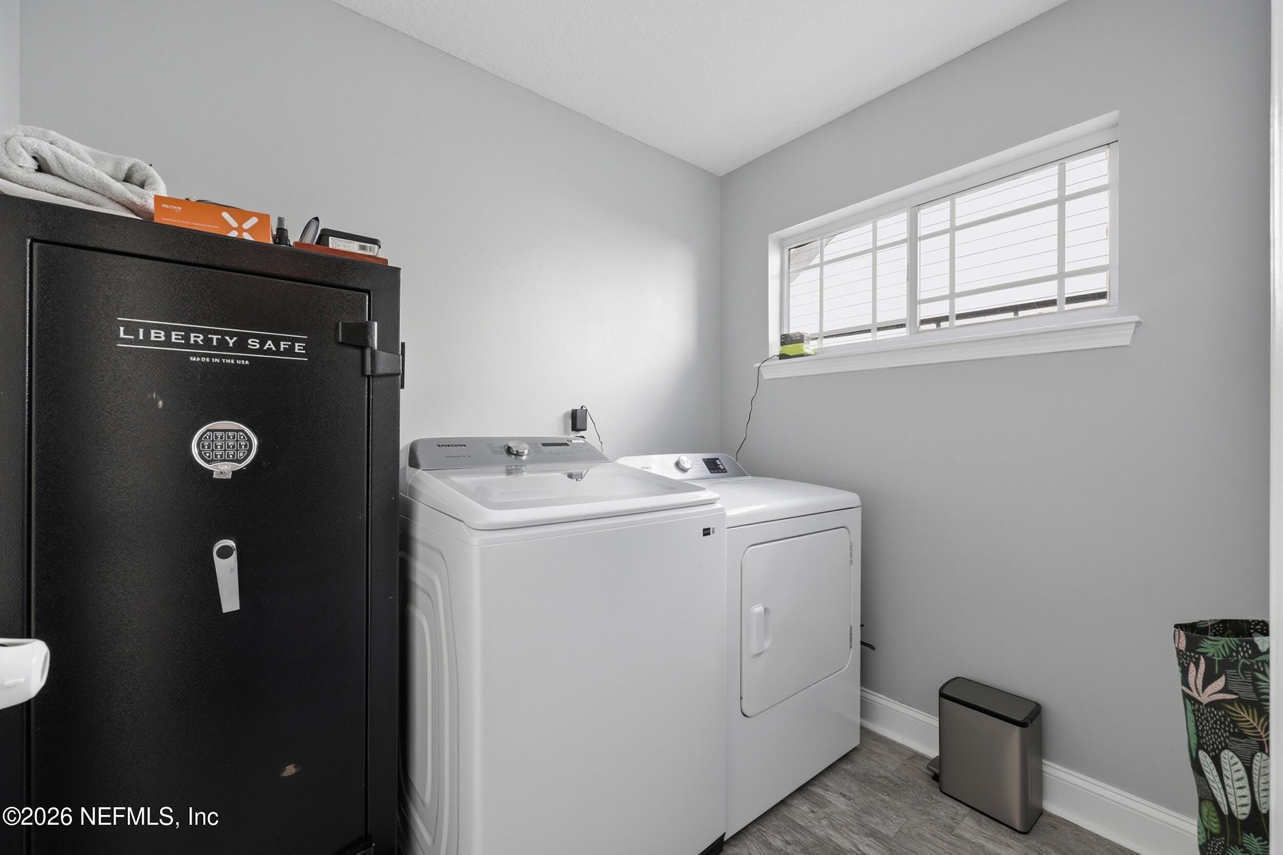 1472 Laurel Way Atlantic Beach, FL 32233 - Photo 16 of 42 a utility room with dryer and washer