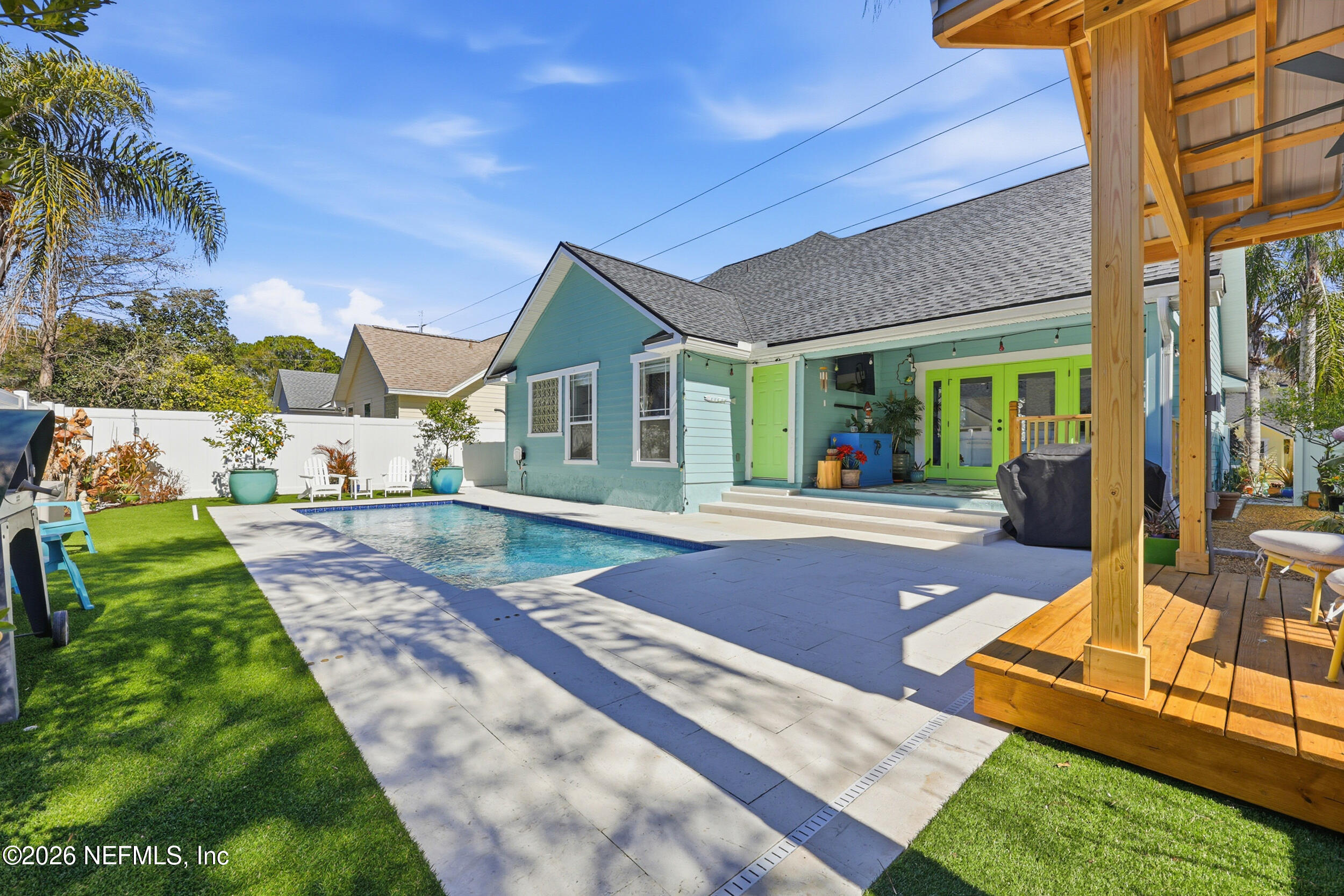 1472 Laurel Way Atlantic Beach, FL 32233 - Photo 35 of 42 a view of an house with swimming pool and porch