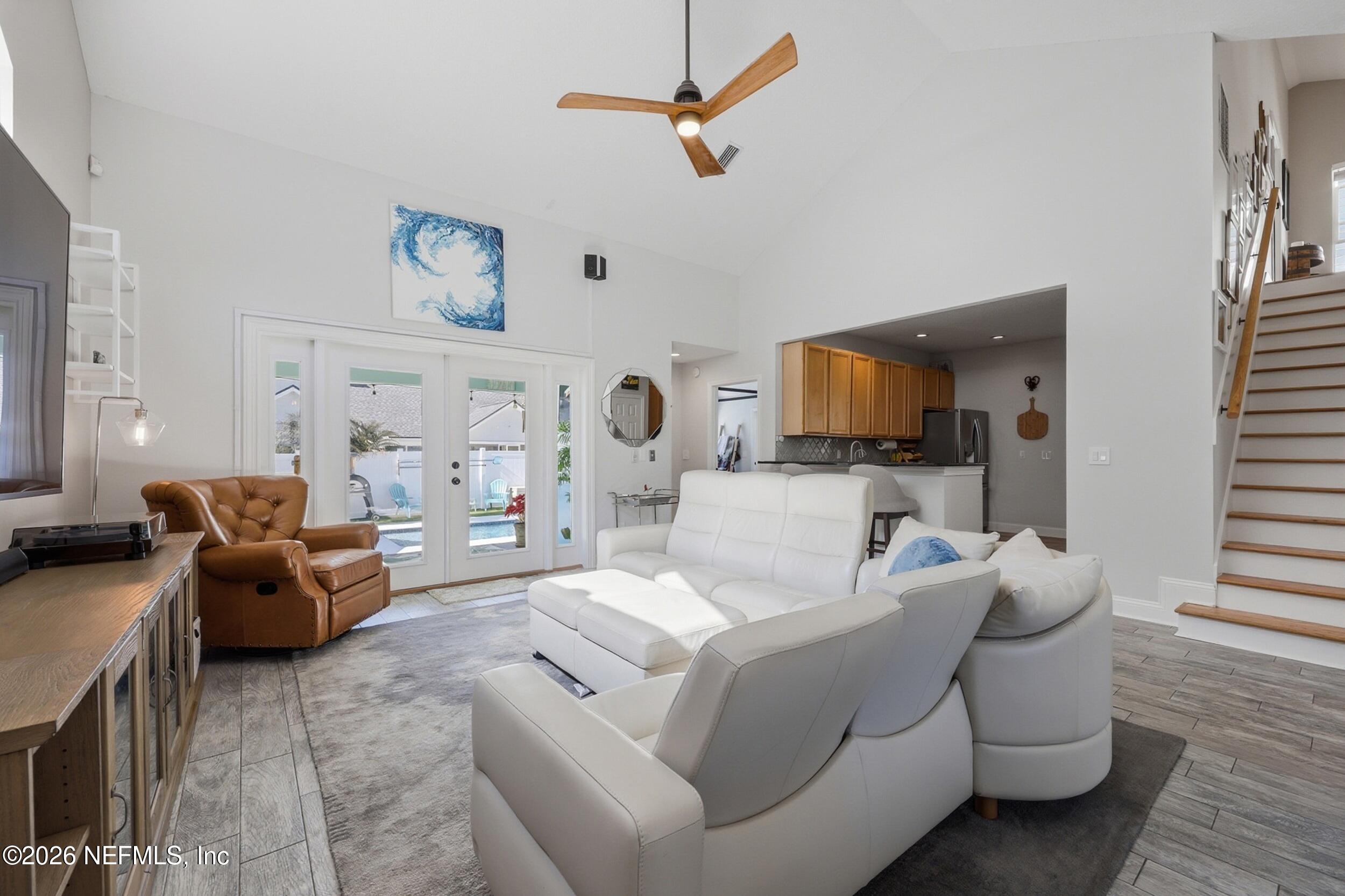 1472 Laurel Way Atlantic Beach, FL 32233 - Photo 6 of 42 a living room with furniture and a flat screen tv