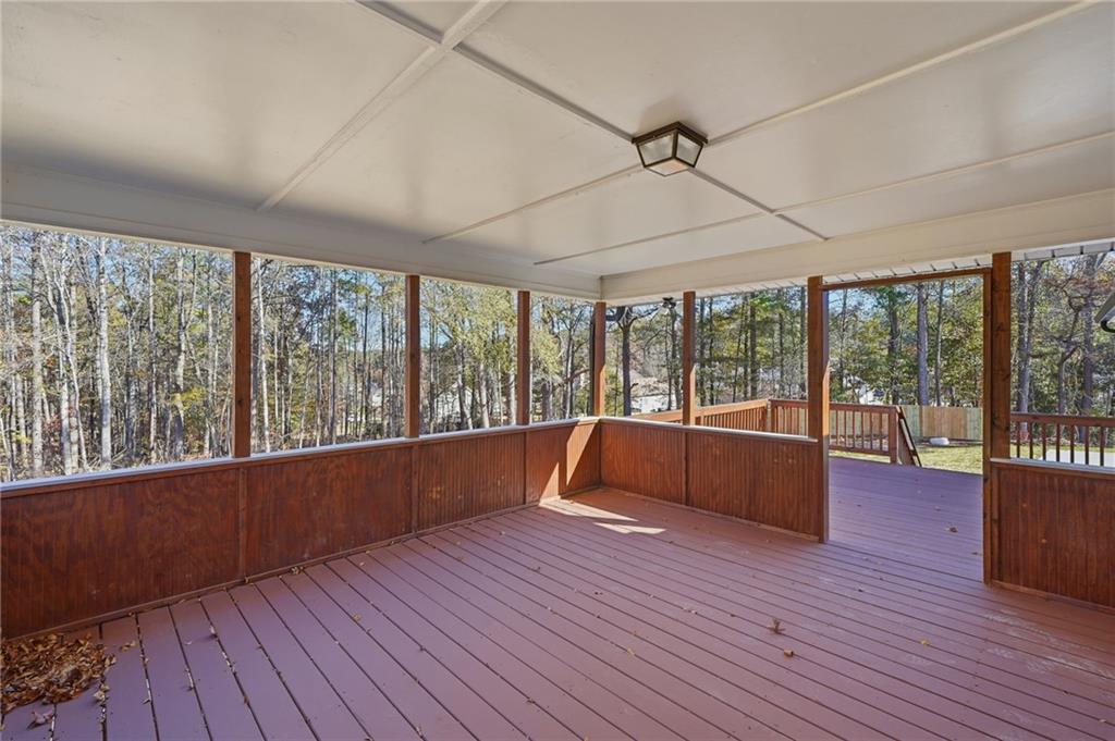 2185 Ridge Road Douglasville, GA 30134 - Photo 35 of 44 a living room with wooden floor and large windows